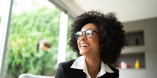 Professional black lady with a pair of Eyeglasses