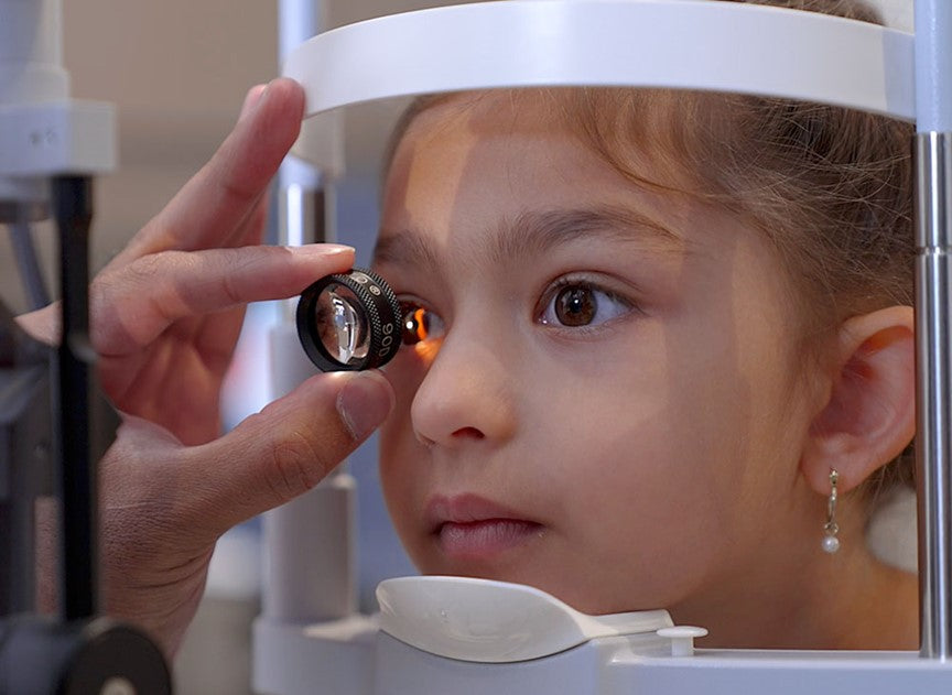 Child undergoing eye exam